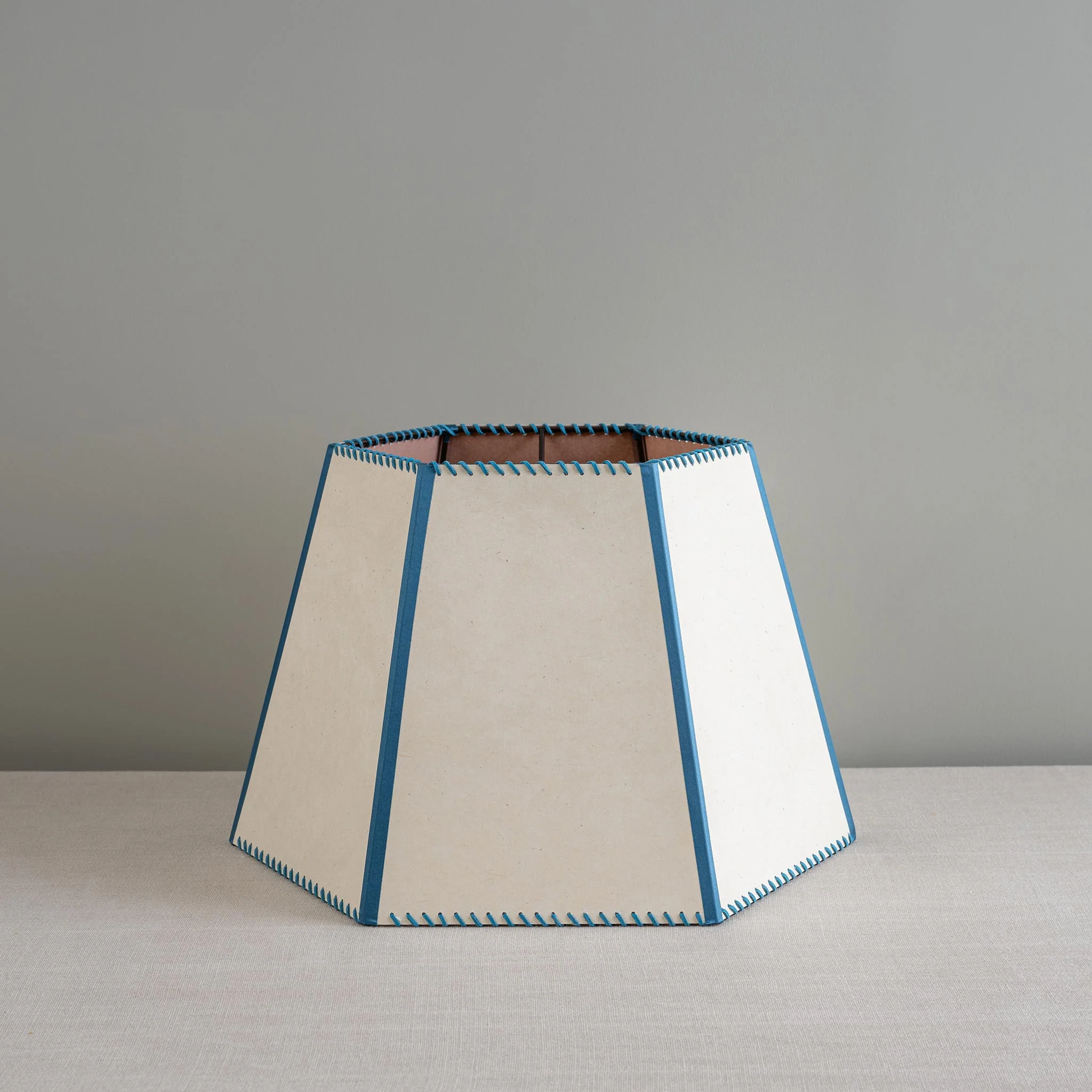 Townhouse Hexagonal Lamp Shade in Soft White with Peacock Blue Trim & Stitching - Image 4
